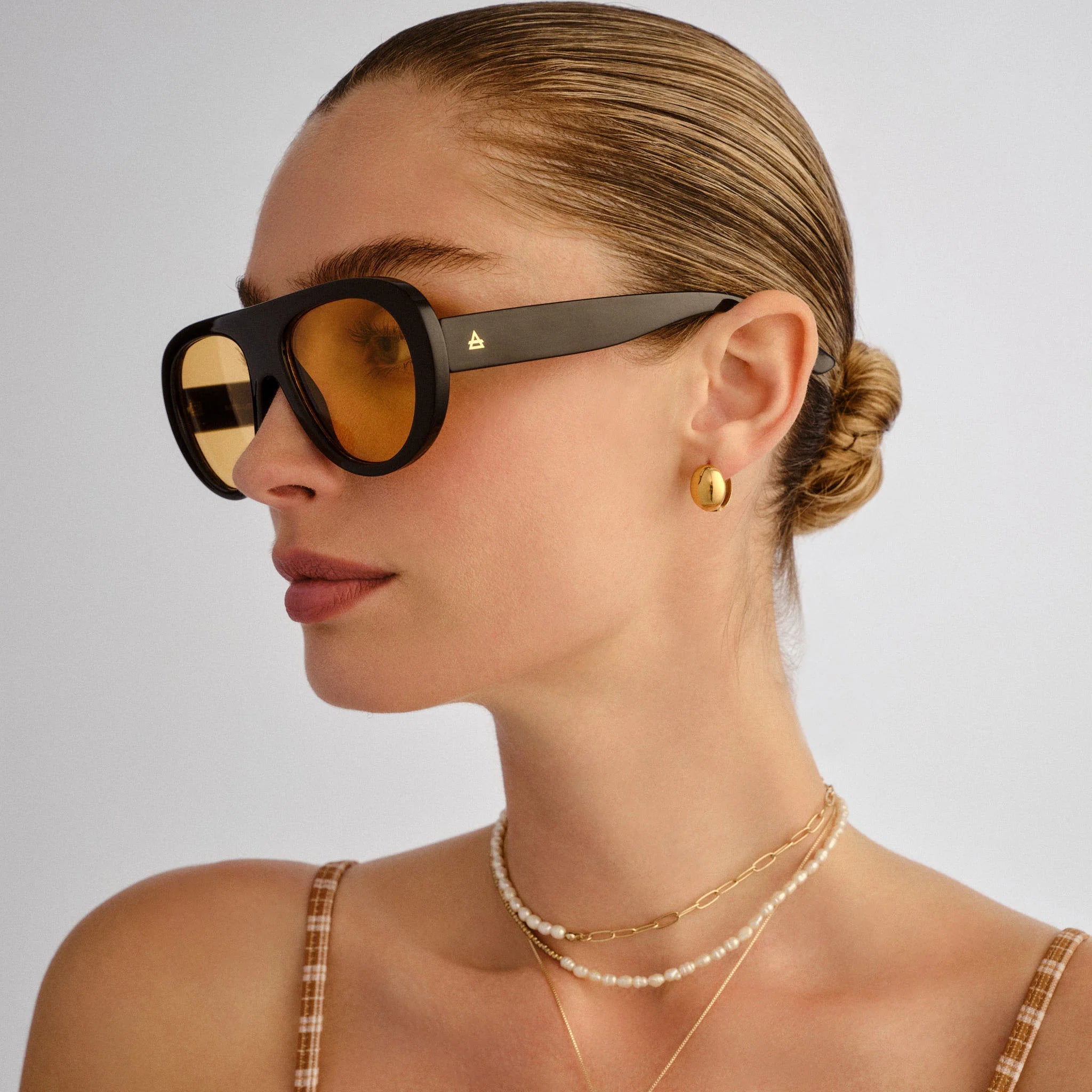 Aire Satellite Sunglasses (Black Amber Tint)